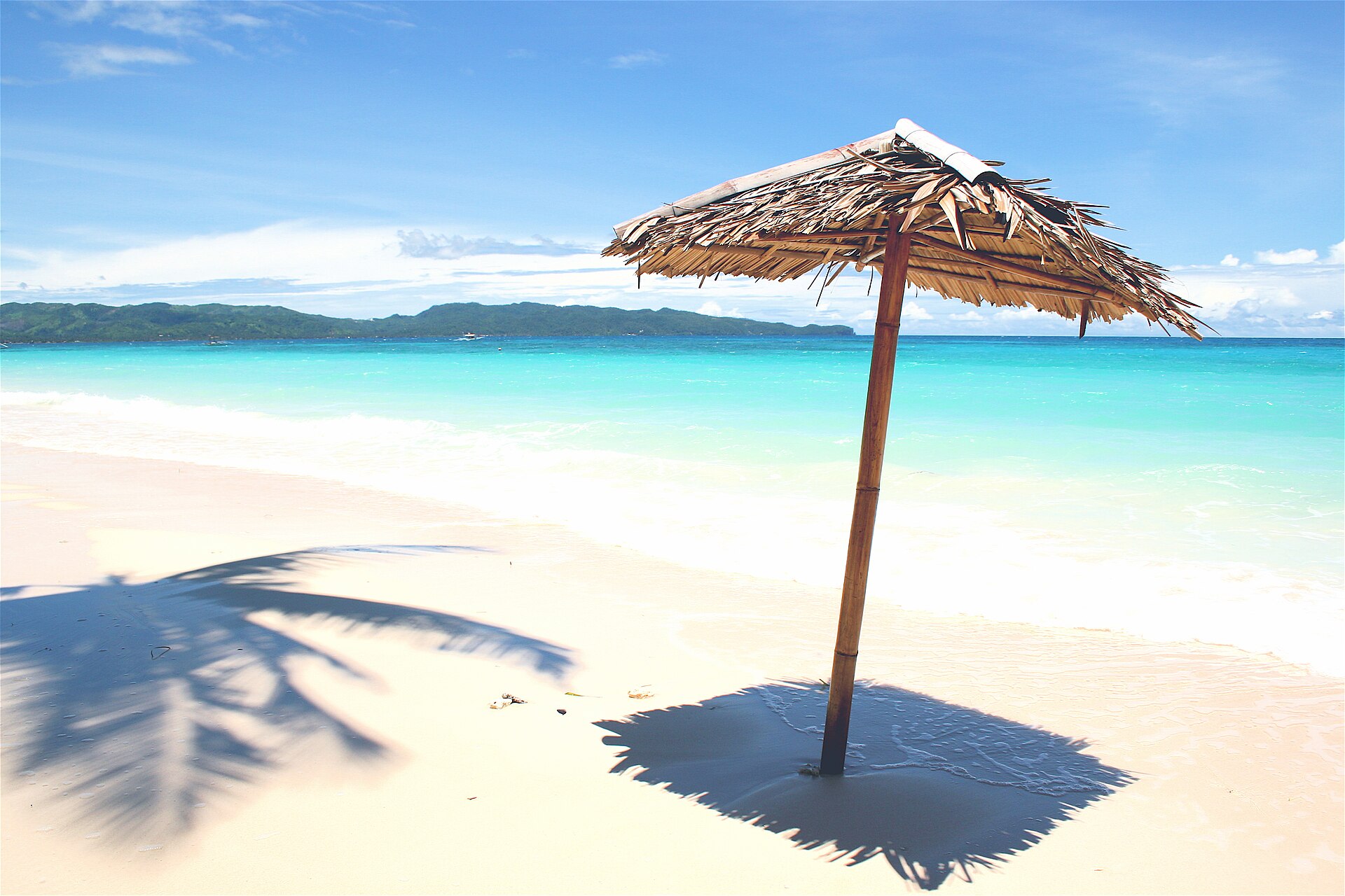 White sand and turquoise water at White Beach, Boracay