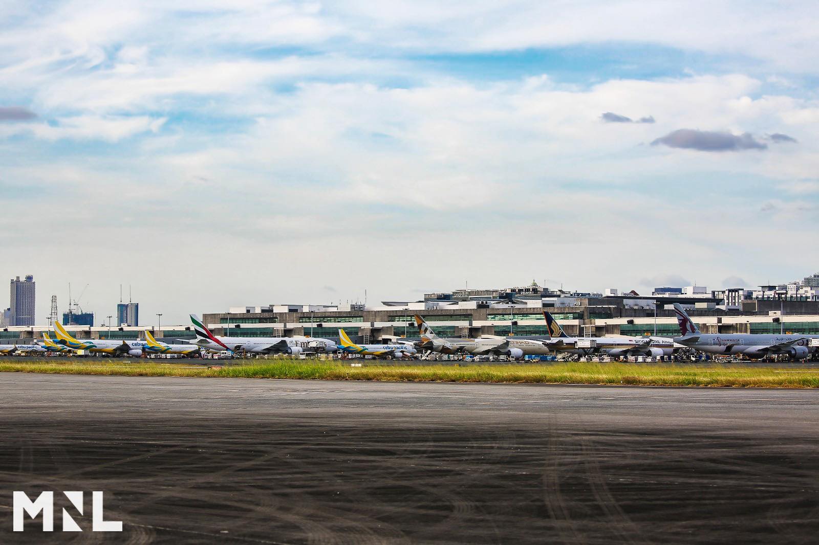 Ninoy Aquino International Airport Terminal 3, with airliners parked at the terminal